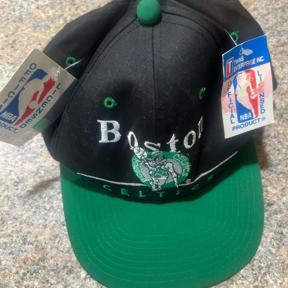 Boston Celtics baseball cap color black and green.